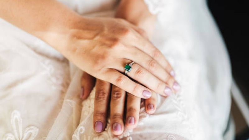 Emerald Ring on Girl's Finger