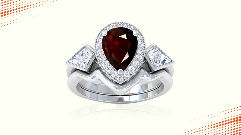 ruby ring with round and kite shaped diamonds