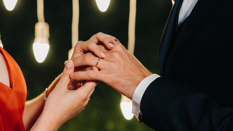 man-wearing-his-wedding-ring-on-the-left-hand