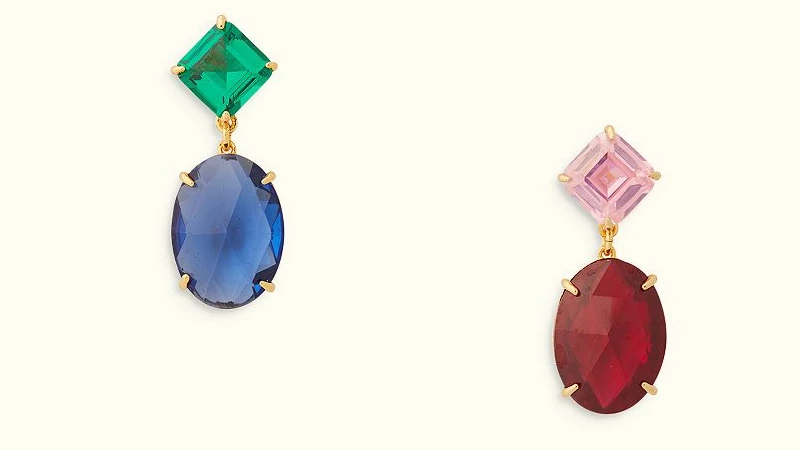 mismatched earrings with a gemstone