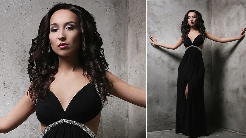 model wearing black evening gown