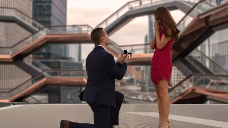 guy proposing his girlfriend in The Vessel structure