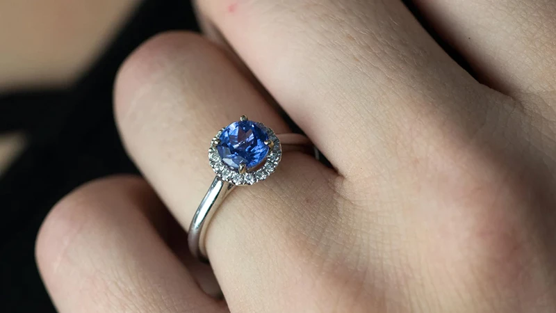 woman wearing tanzanite ring