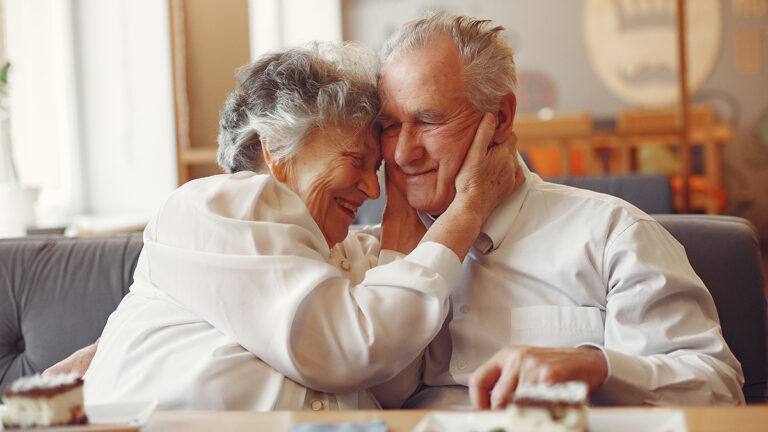 Smiling old age couple