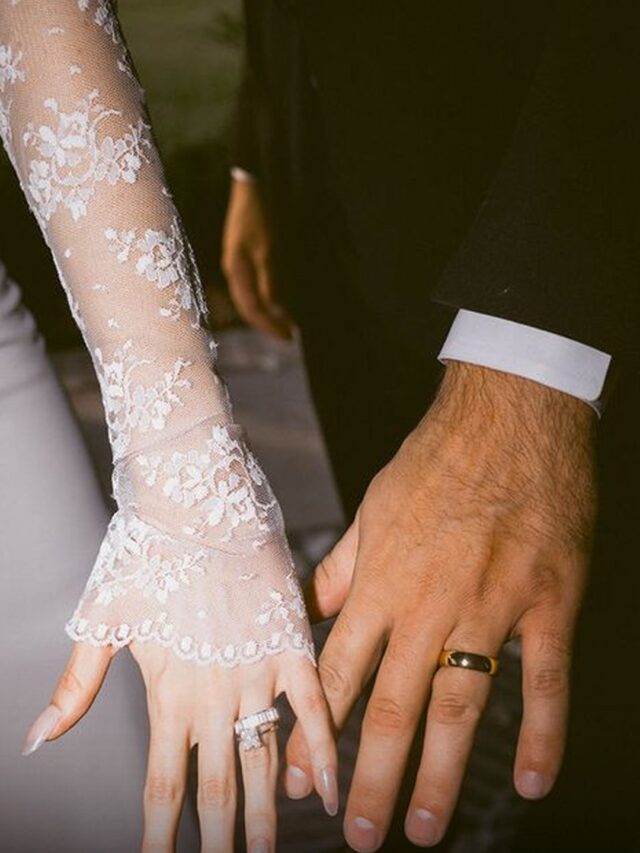 bride and groom wearing engagement ring