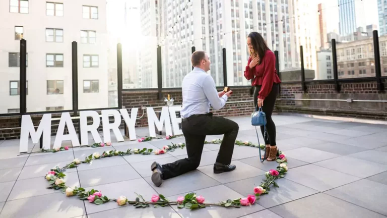 man making love proposal in front of buildings and NYC