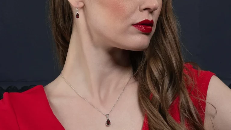 girl wearing garnet earrings and pendant